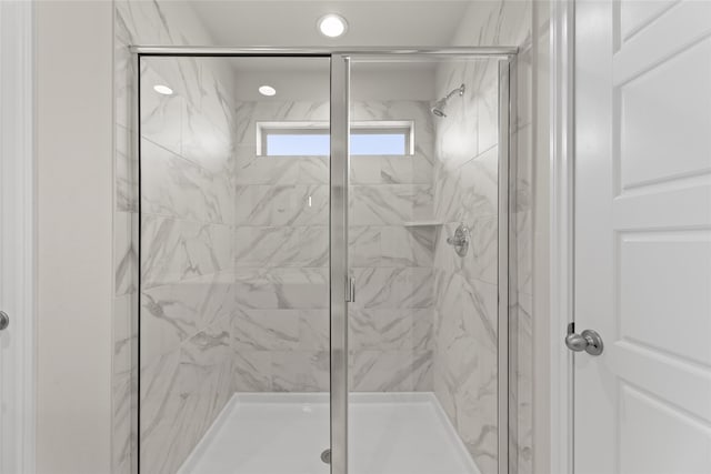 bathroom with an enclosed shower