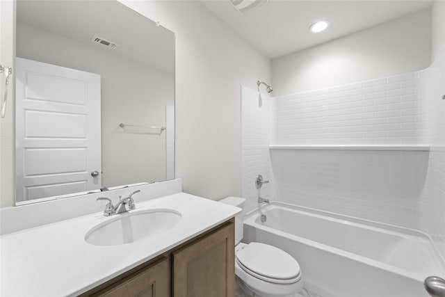 full bathroom featuring vanity, toilet, and shower / washtub combination