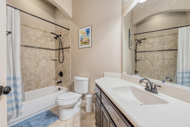 full bathroom with tile patterned floors, toilet, vanity, and shower / bath combo