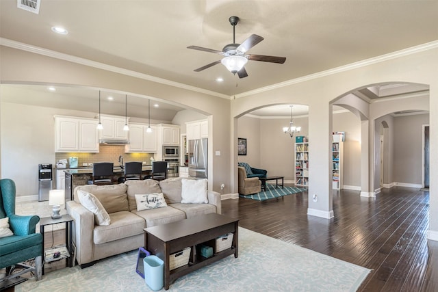 1772 Laramie Ln, Burleson, TX 76028 - living room featuring ceiling fan, arched walkways, hardwood / wood-style flooring, baseboards, and recessed lighting