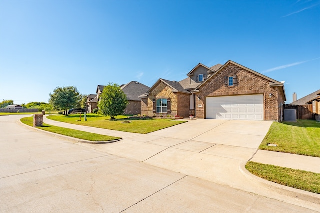 craftsman-style home featuring a garage and a front lawn