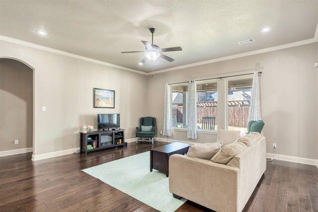 foyer entrance featuring crown molding, light hardwood / wood-style floors, and a textured ceiling