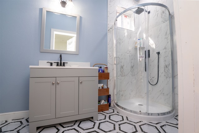 bathroom featuring vanity, tile patterned floors, and walk in shower