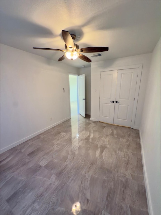 empty room with ceiling fan