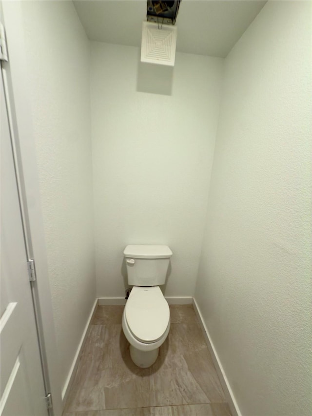 bathroom featuring toilet