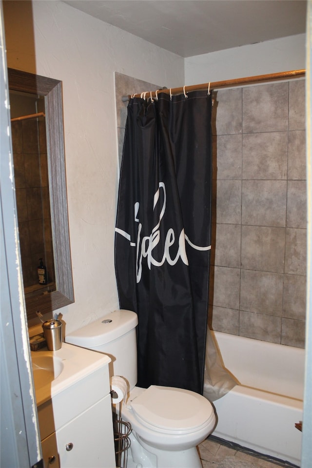 full bathroom featuring toilet, vanity, and shower / bathtub combination with curtain