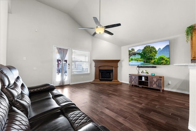 unfurnished living room featuring lofted ceiling, ceiling fan, and dark hardwood / wood-style flooring