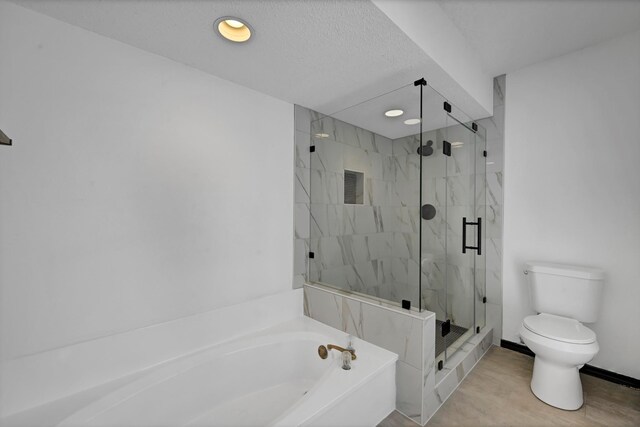 bathroom with separate shower and tub, hardwood / wood-style flooring, and toilet