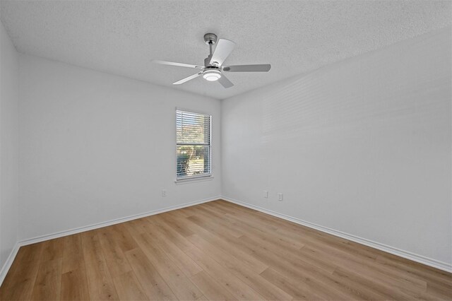 unfurnished room with light hardwood / wood-style flooring, a textured ceiling, and ceiling fan