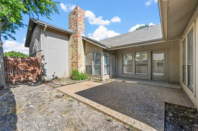 back of house featuring a patio