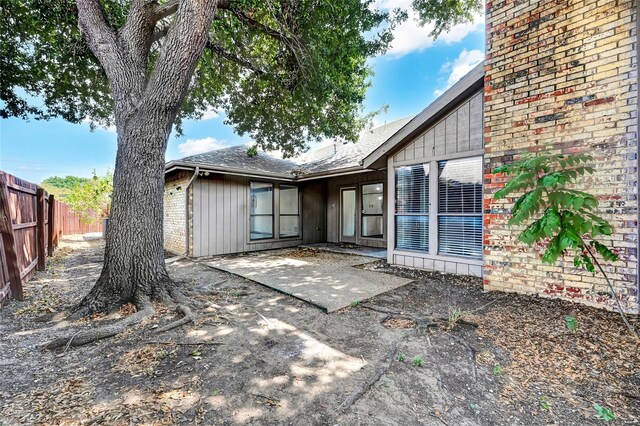 rear view of house with a patio area