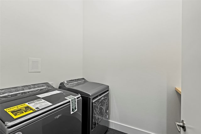 laundry room with washer and dryer