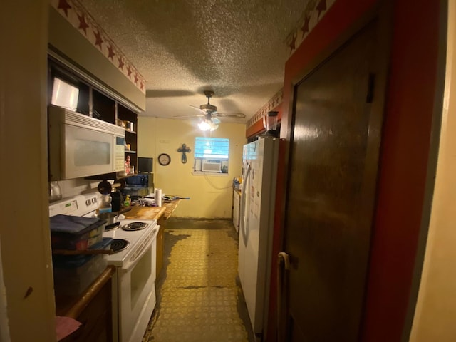 kitchen featuring white appliances, butcher block counters, a textured ceiling, cooling unit, and ceiling fan