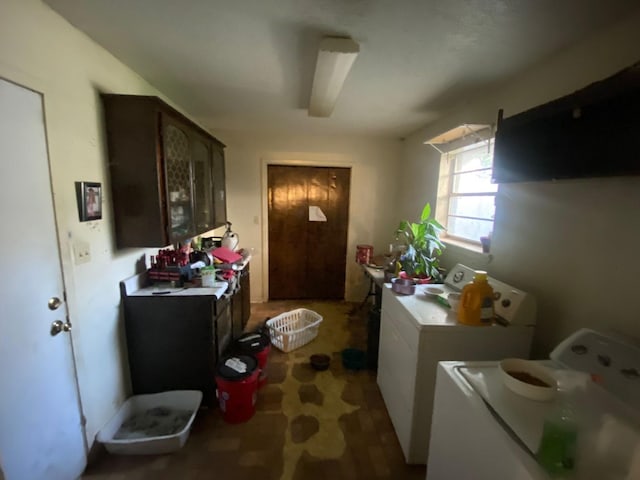 washroom featuring washing machine and dryer