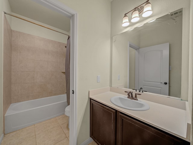 full bathroom featuring vanity, shower / bath combination with curtain, toilet, and tile patterned flooring