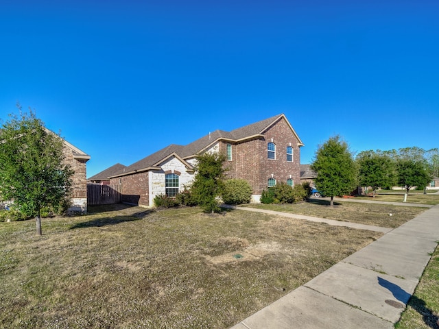 exterior space with a lawn