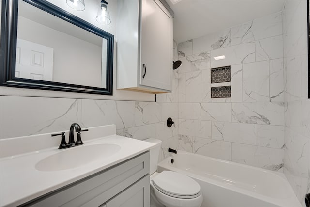 full bathroom with decorative backsplash, toilet, tile walls, vanity, and tiled shower / bath combo