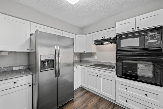 kitchen with dark hardwood / wood-style floors, black appliances, stone counters, white cabinetry, and a textured ceiling