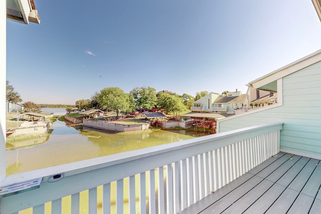 balcony featuring a water view