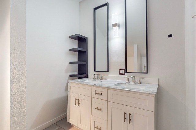 bathroom with vanity and tile patterned floors