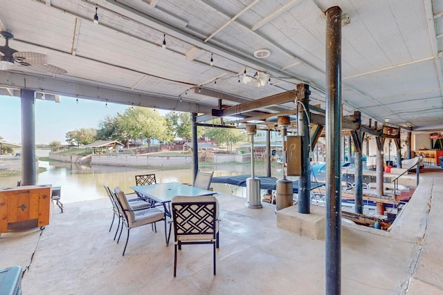 view of patio featuring a water view