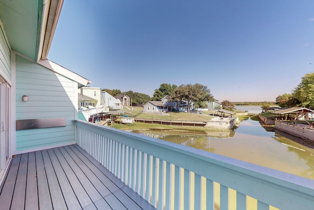 wooden terrace with a water view