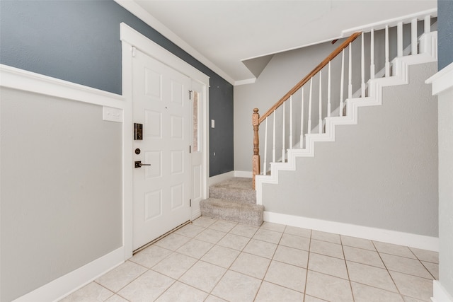 entrance foyer featuring light tile patterned flooring