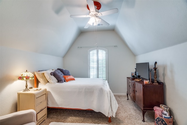 carpeted bedroom with lofted ceiling and ceiling fan