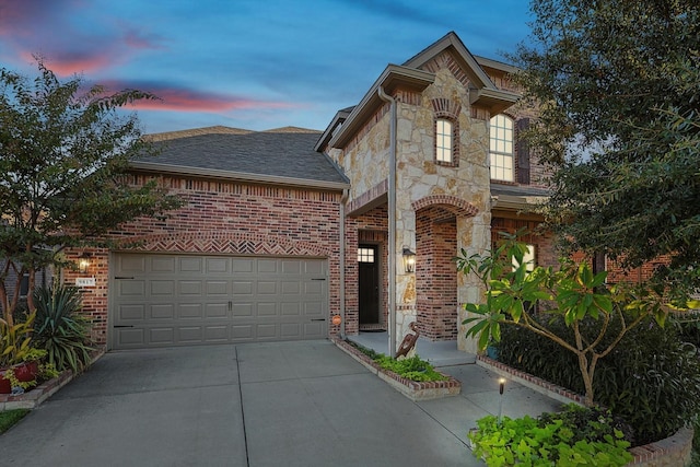 view of front of house with a garage