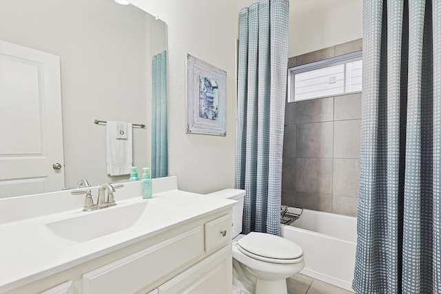 full bathroom with vanity, toilet, tile patterned flooring, and shower / bath combo