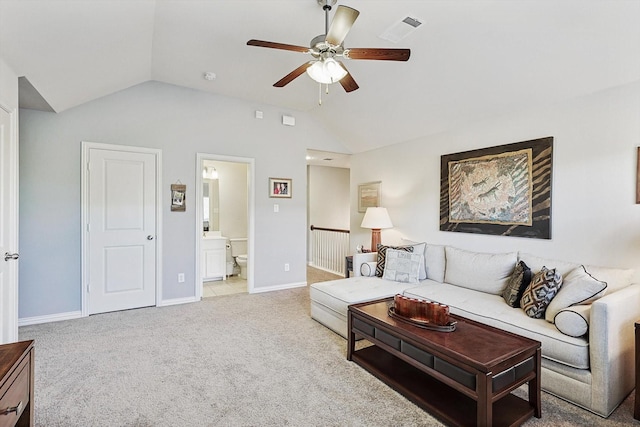 living room featuring lofted ceiling, light carpet, and ceiling fan