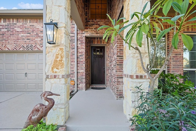 entrance to property featuring a garage