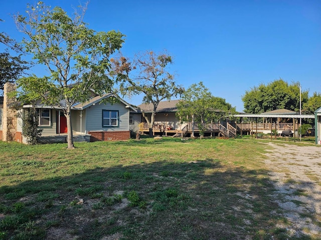 view of yard featuring a deck