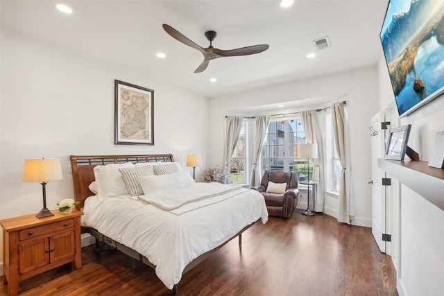 bedroom featuring dark hardwood / wood-style floors and ceiling fan