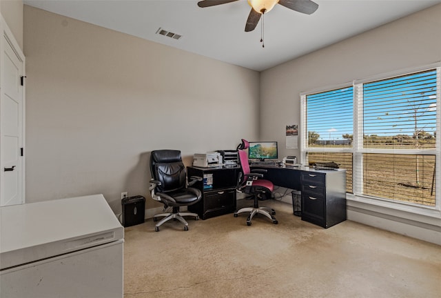 office featuring a healthy amount of sunlight and ceiling fan