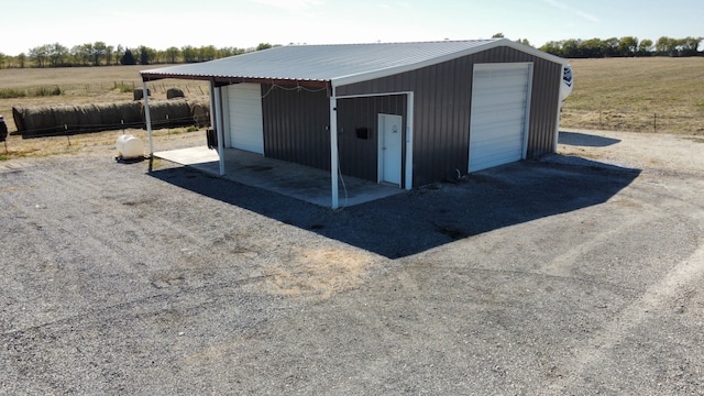 garage with a rural view