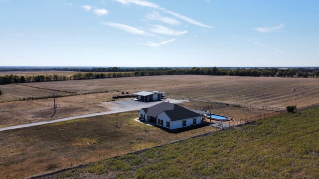 view of yard with a rural view