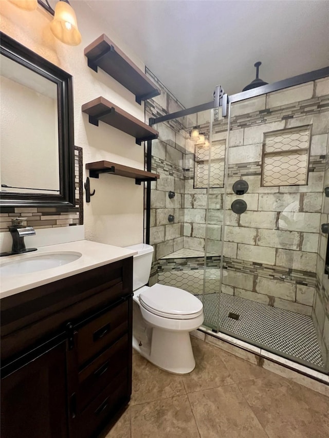 bathroom with walk in shower, backsplash, vanity, and toilet