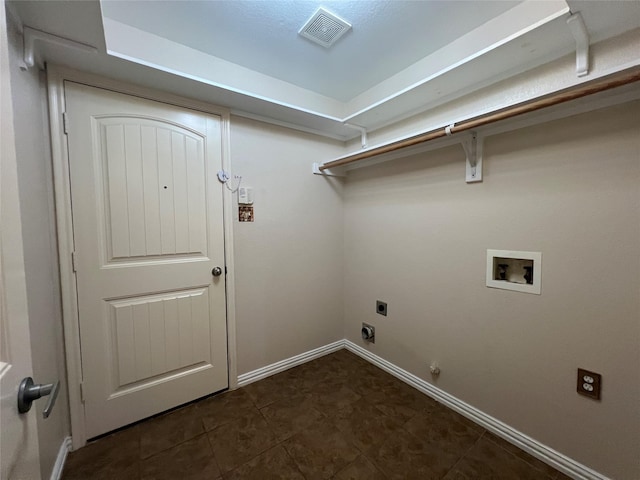 clothes washing area with gas dryer hookup, hookup for a washing machine, and hookup for an electric dryer