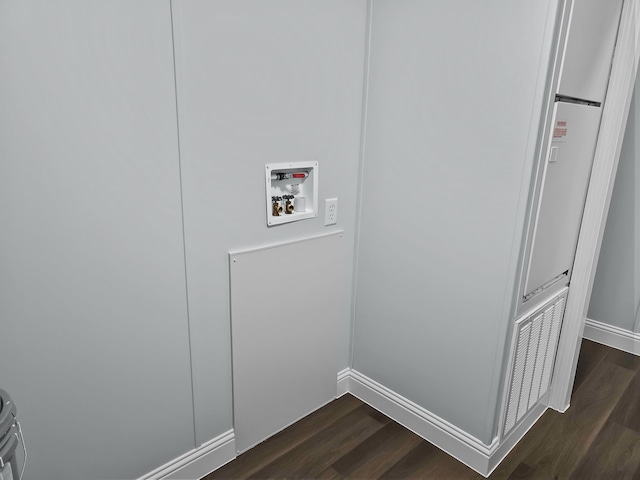 laundry room featuring hookup for a washing machine and dark hardwood / wood-style floors