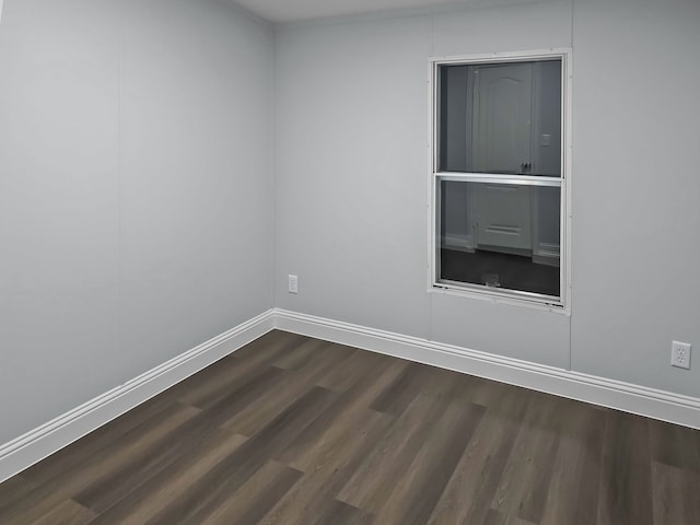 unfurnished room featuring wood-type flooring