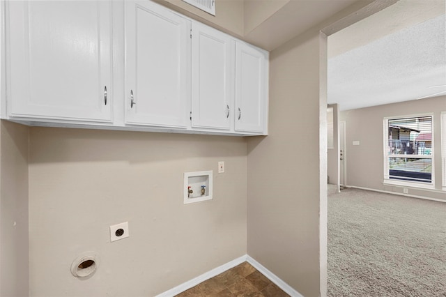 laundry room with a textured ceiling, carpet floors, electric dryer hookup, washer hookup, and cabinets