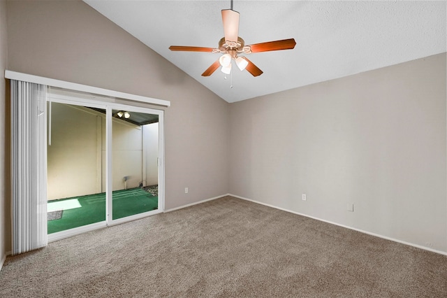 carpeted empty room featuring high vaulted ceiling and ceiling fan