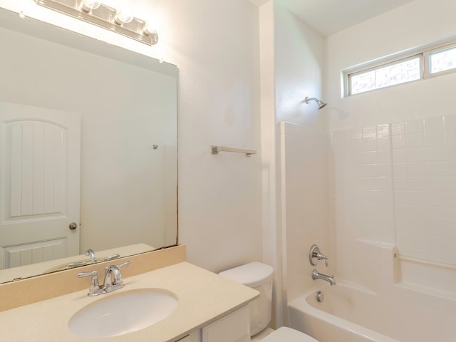 full bathroom featuring vanity, toilet, and shower / tub combination