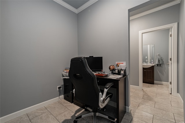 tiled home office featuring sink and crown molding