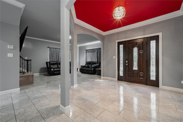 entryway featuring ornamental molding