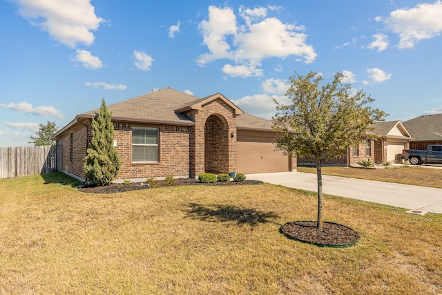 ranch-style home featuring a front yard and a garage