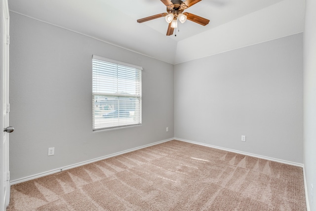 empty room with carpet flooring and ceiling fan