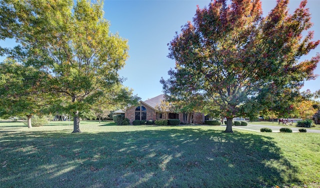 view of front of property with a front lawn