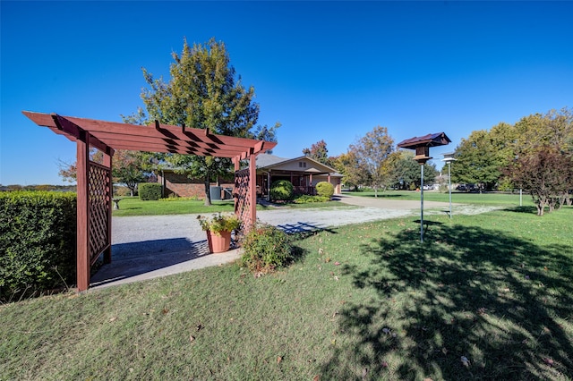 view of yard with a pergola